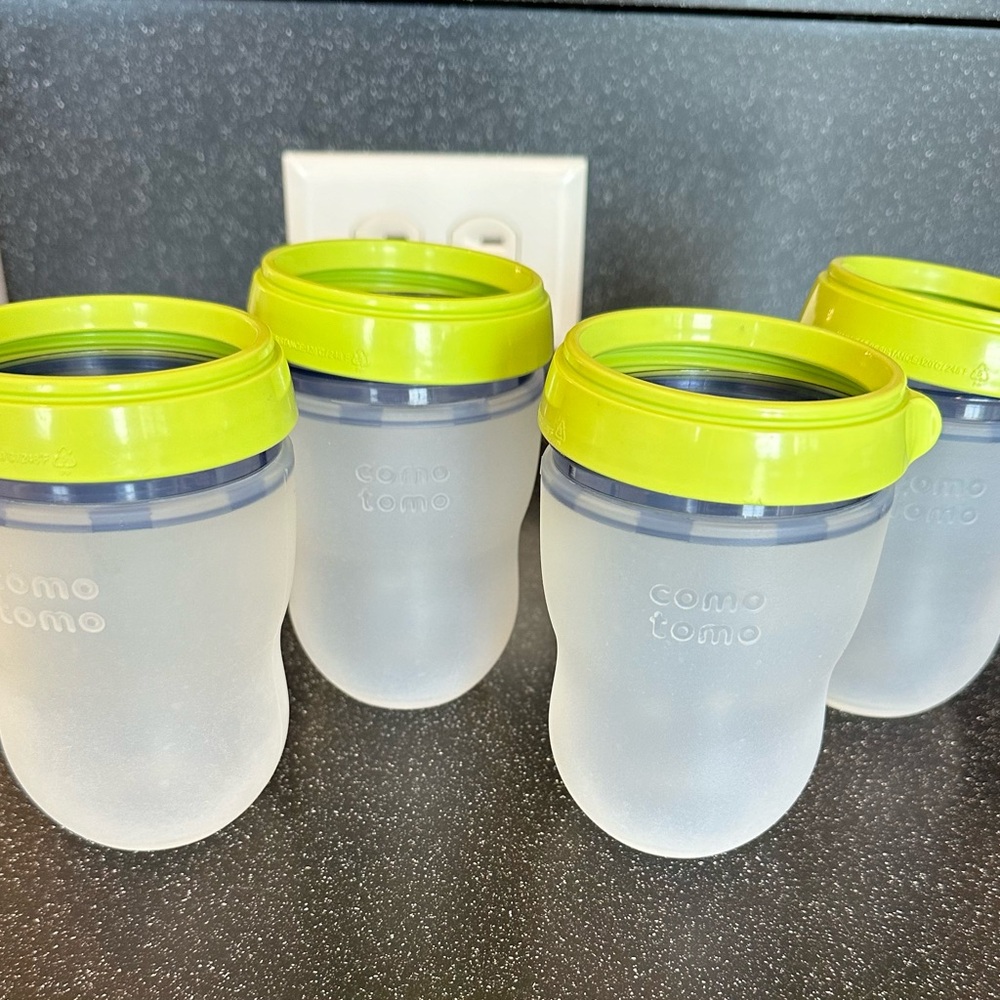 4 Como Tomo bottles, 8 ounces.